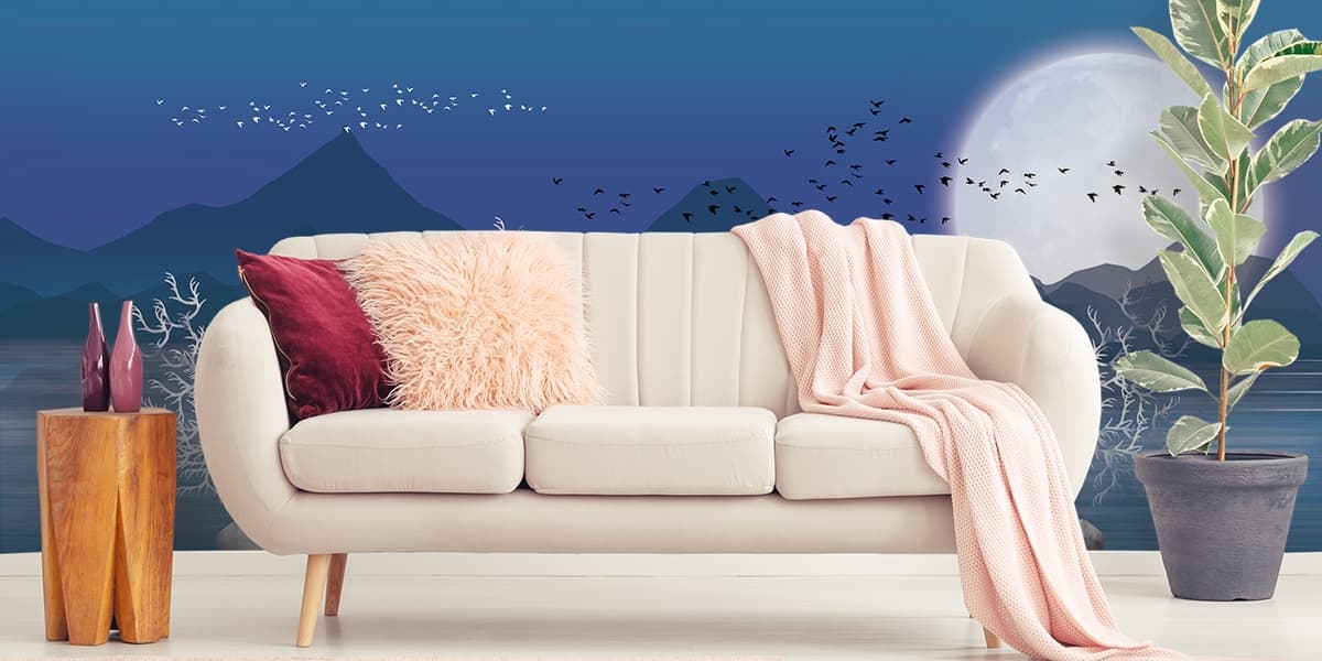 Modern Blue Hills and Large White Moon Wallpaper shown in a room