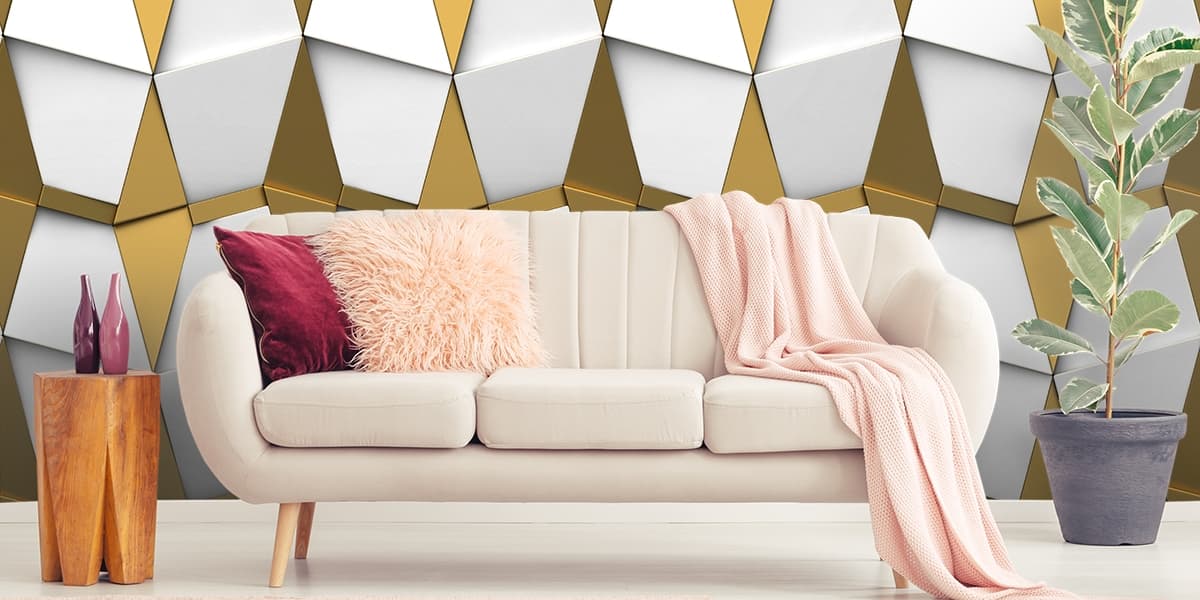A white and gold triangle shapes shown in a room