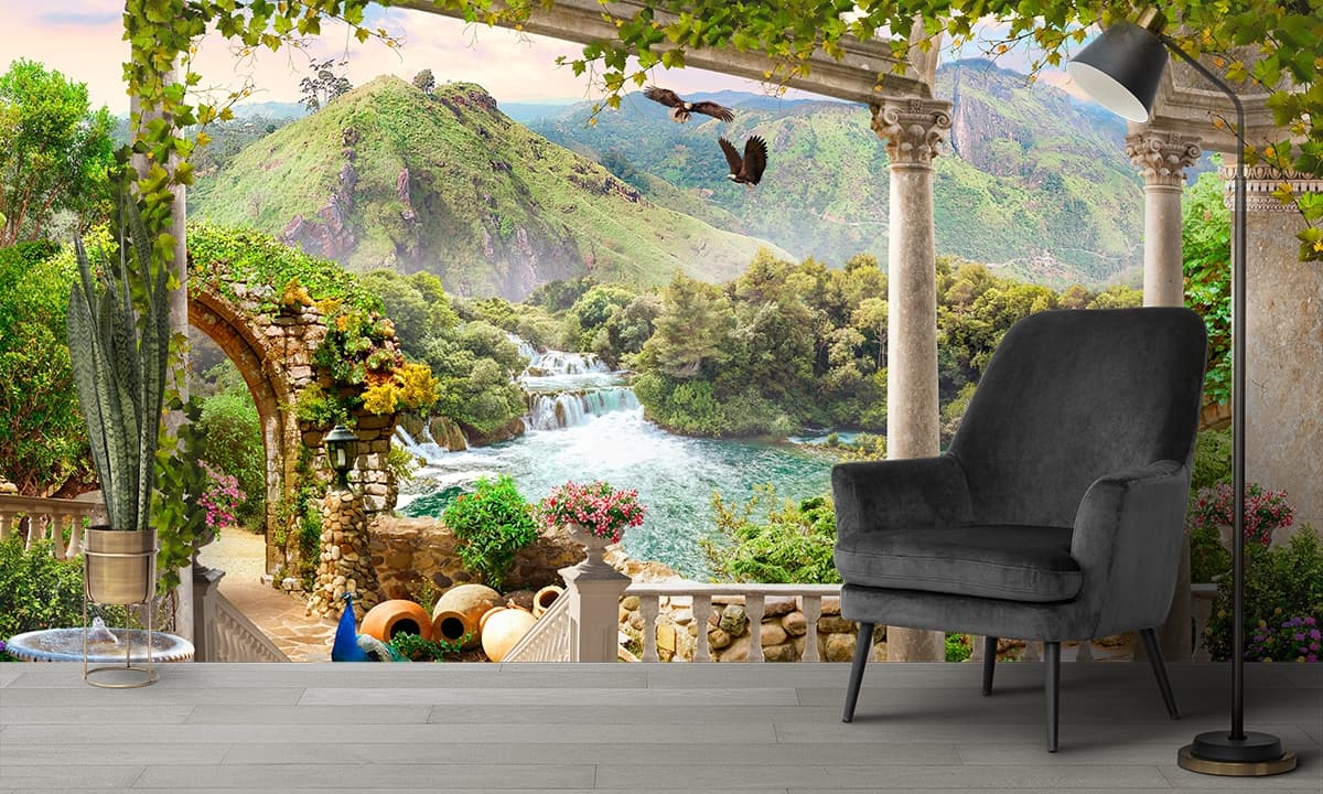 Serene stone porch waterfall with birds flying wallpaper shown in a room