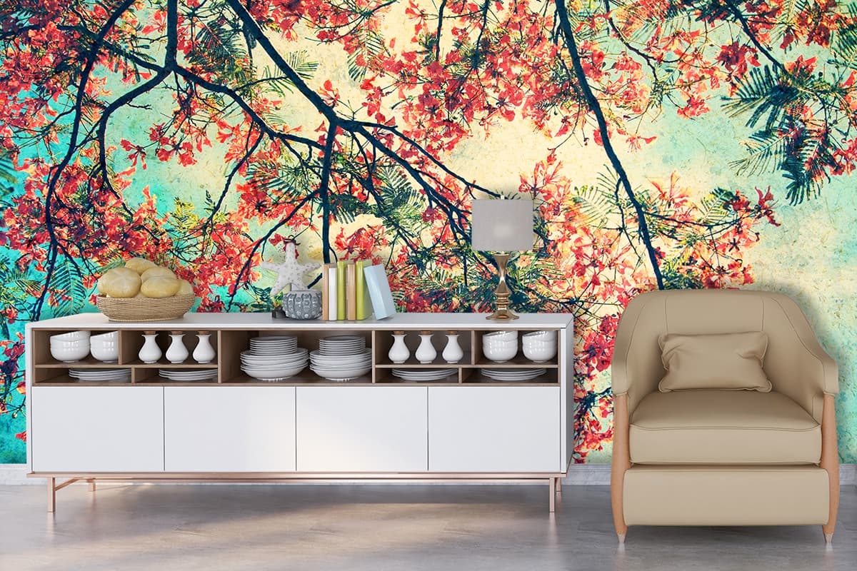 A tree with red flowers shown in a room