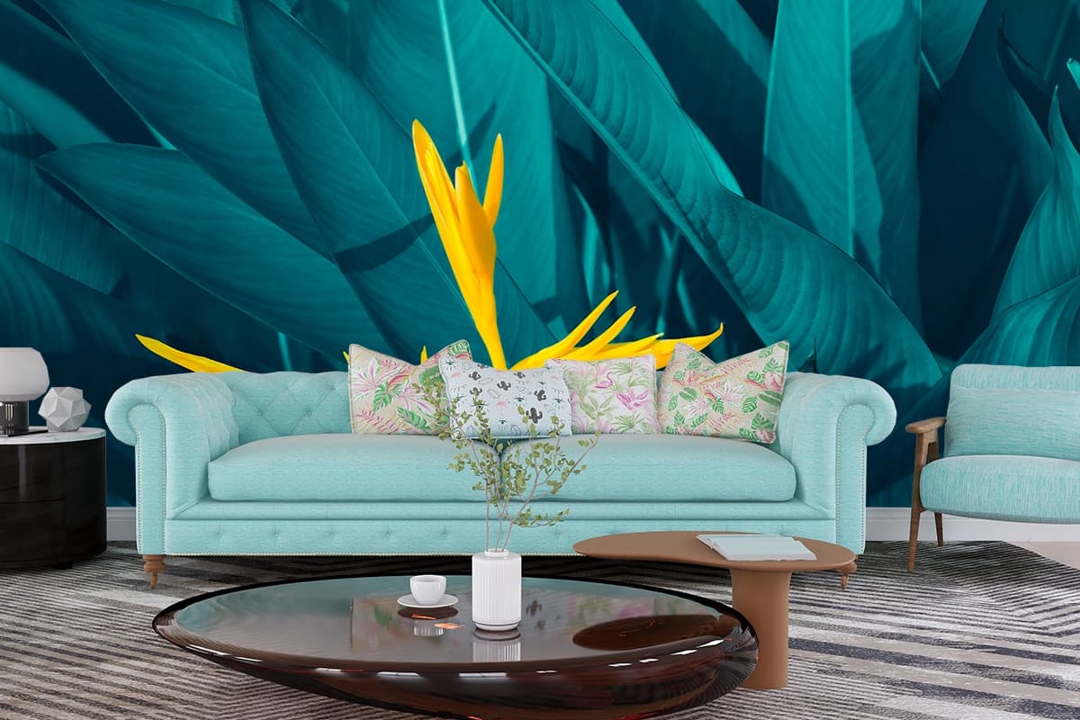 Tropical Blue Leaves and Yellow Flower Wallpaper shown in a room