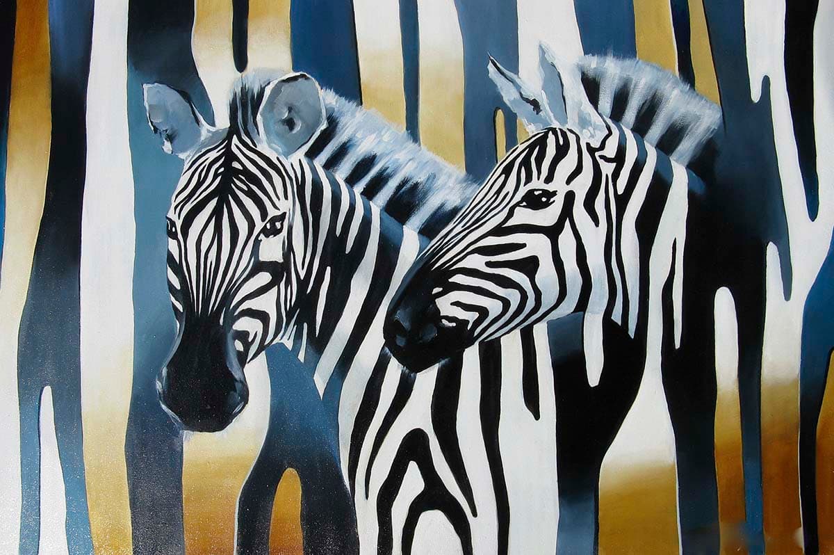 A painting of zebras in front of a blue and gold background pattern detail