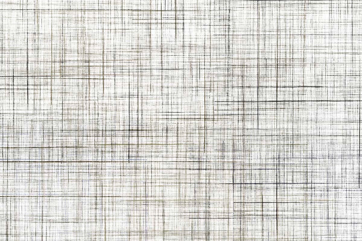 A white fabric with black lines pattern detail