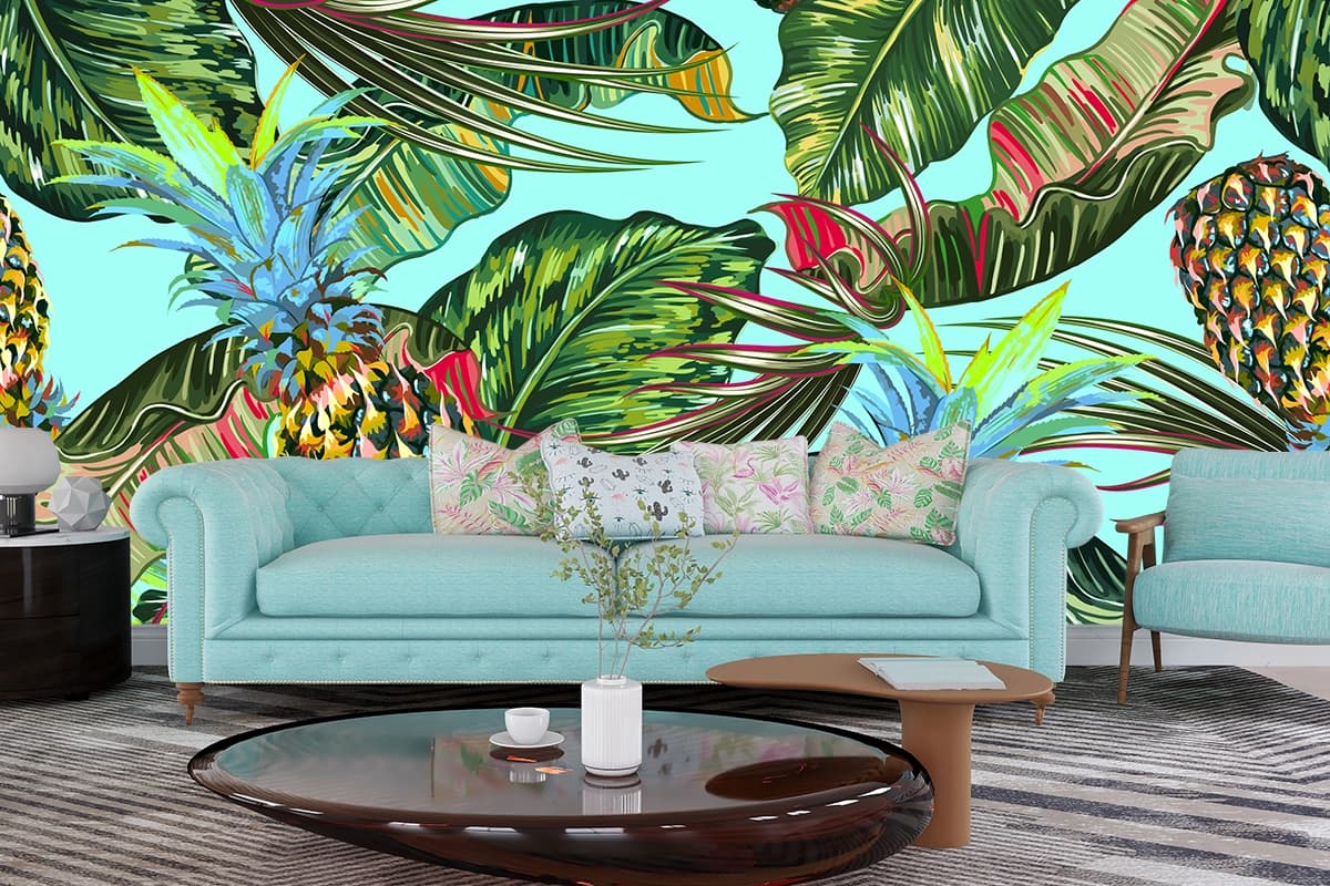 A pineapples and leaves on a blue background shown in a room