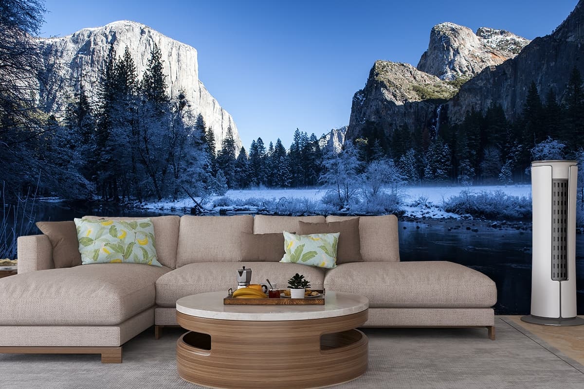 Premium Glacier River Landscape with Snow Peaks Wallpaper shown in a room