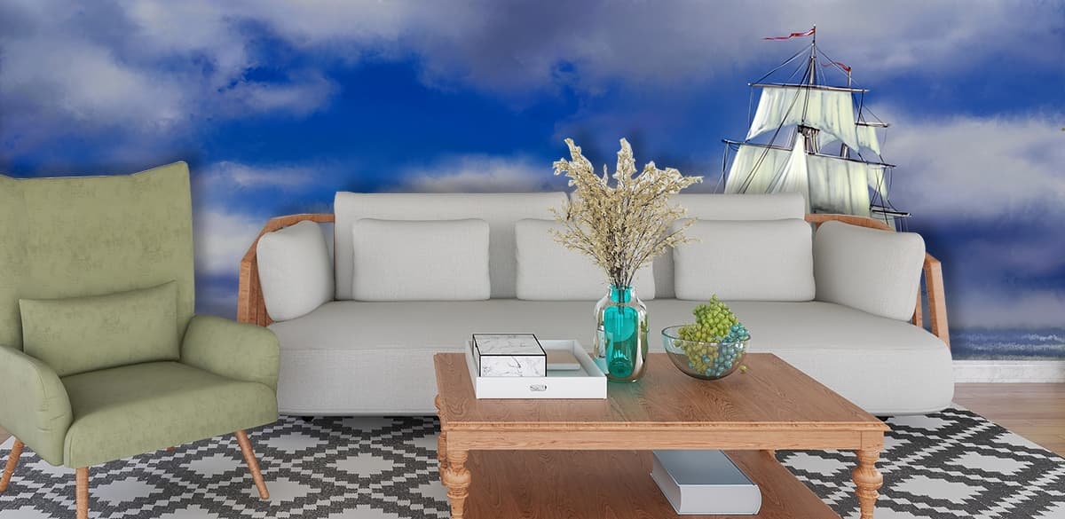 A sailboat in the ocean shown in a room