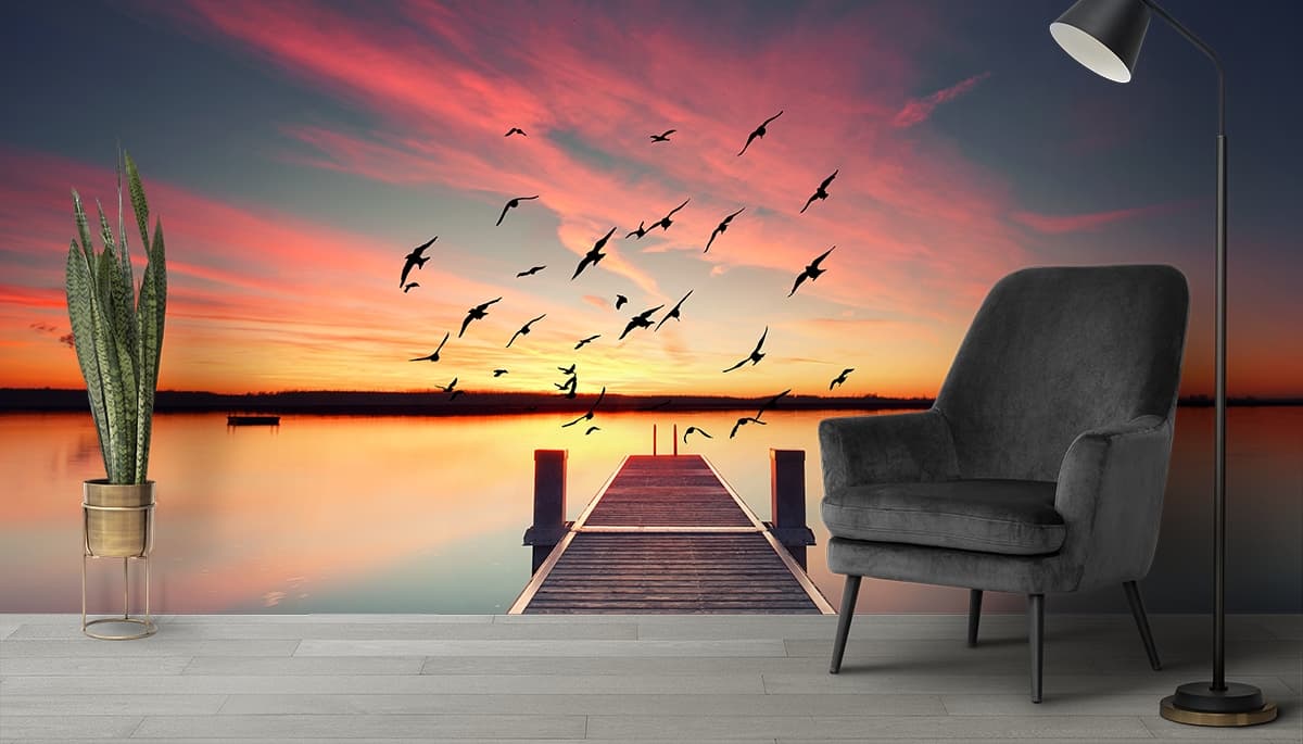 Serene Birds Flying Over Dock Scenic Wallpaper shown in a room