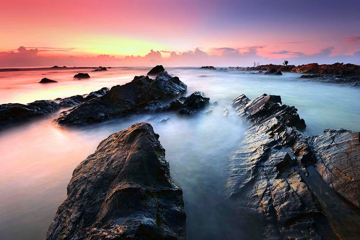 Rocky Beach with Person Scenic Ocean Wall Mural Wallpaper pattern detail