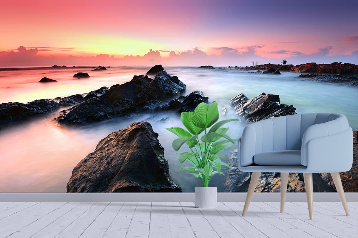 Rocky Beach with Person Scenic Ocean Wall Mural Wallpaper shown in a room