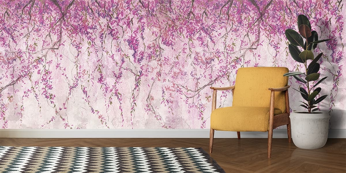 Pink Cherry Blossom Branches on Textured Wallpaper shown in a room