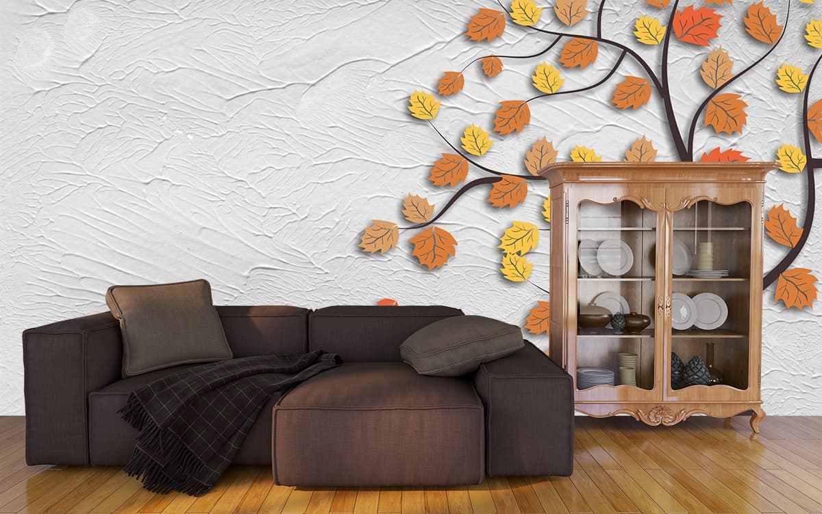A tree with leaves on it shown in a room
