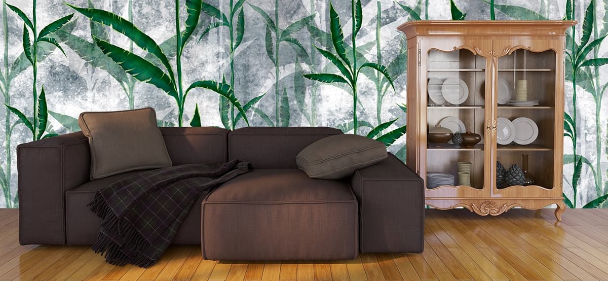 Tropical Green Leaves Pattern Wallpaper Mural shown in a room