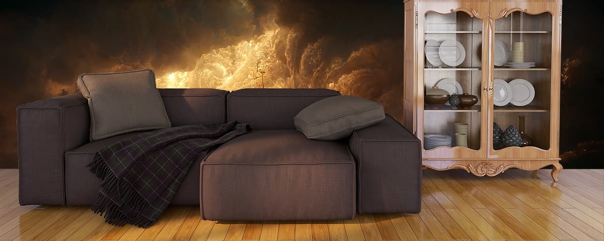 A large wave of water with a ship in the water shown in a room