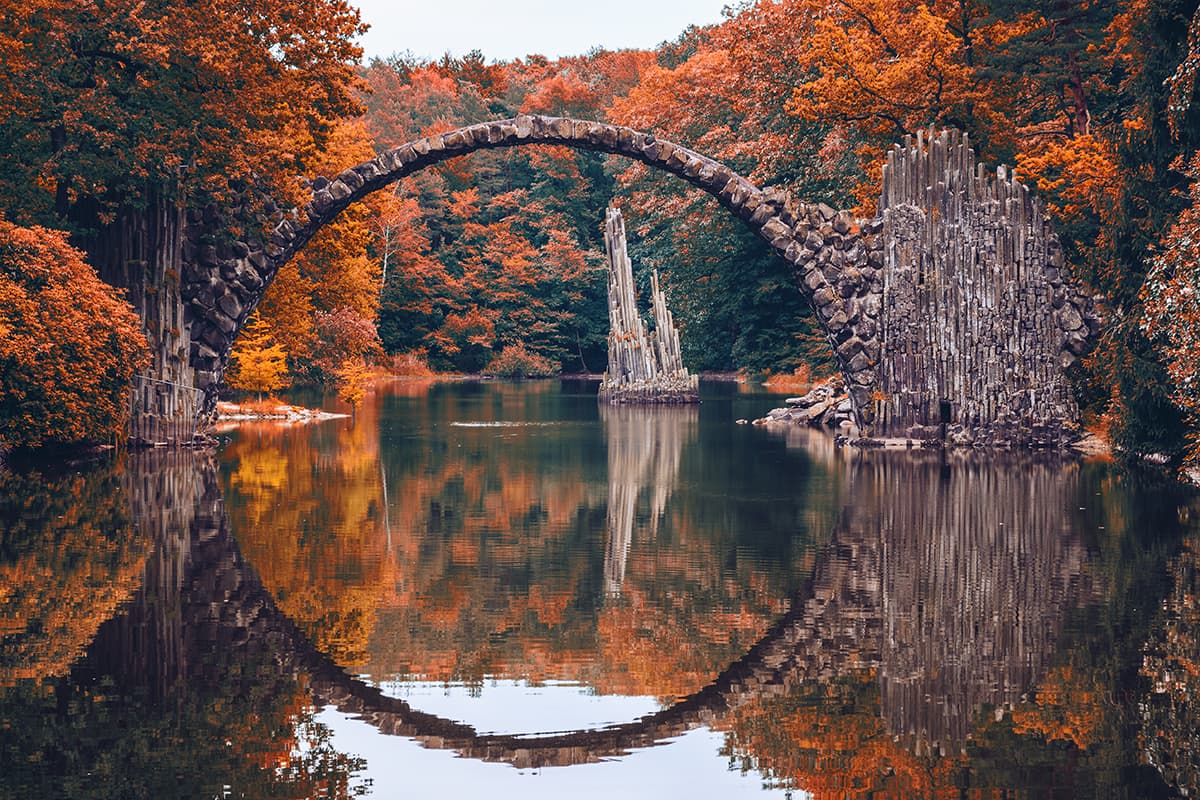 Elegant Stone Arch Bridge Autumn Lake Wallpaper pattern detail