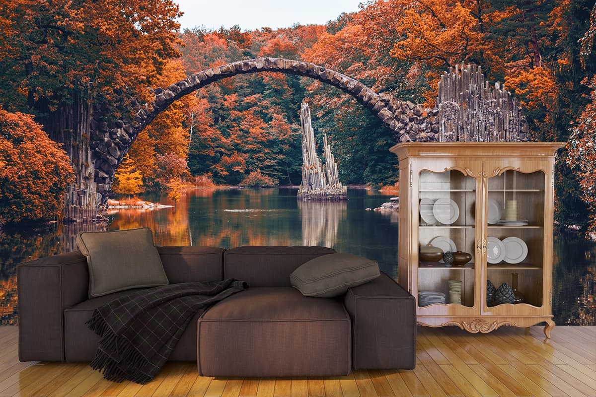 Elegant Stone Arch Bridge Autumn Lake Wallpaper shown in a room