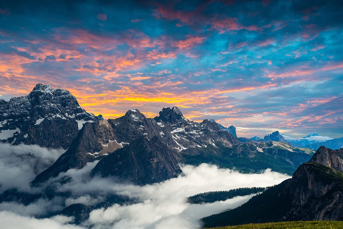 Serene Mountain Range with Clouds Scenic Wallpaper pattern detail