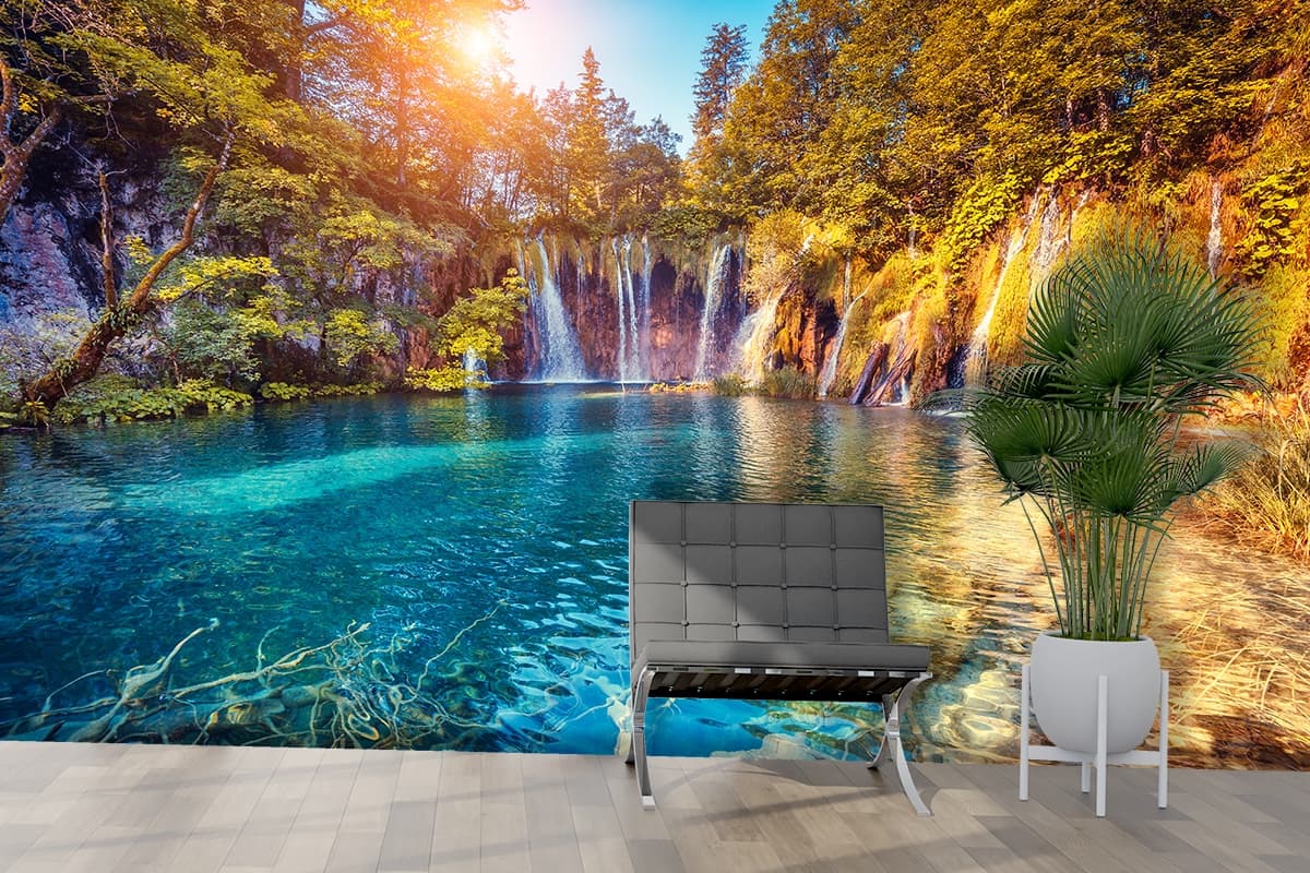 Waterfall in a Forest Serene Nature View Wallpaper shown in a room