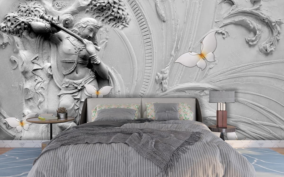 Statue of Krishna Playing Flute Mural Wallpaper shown in a room