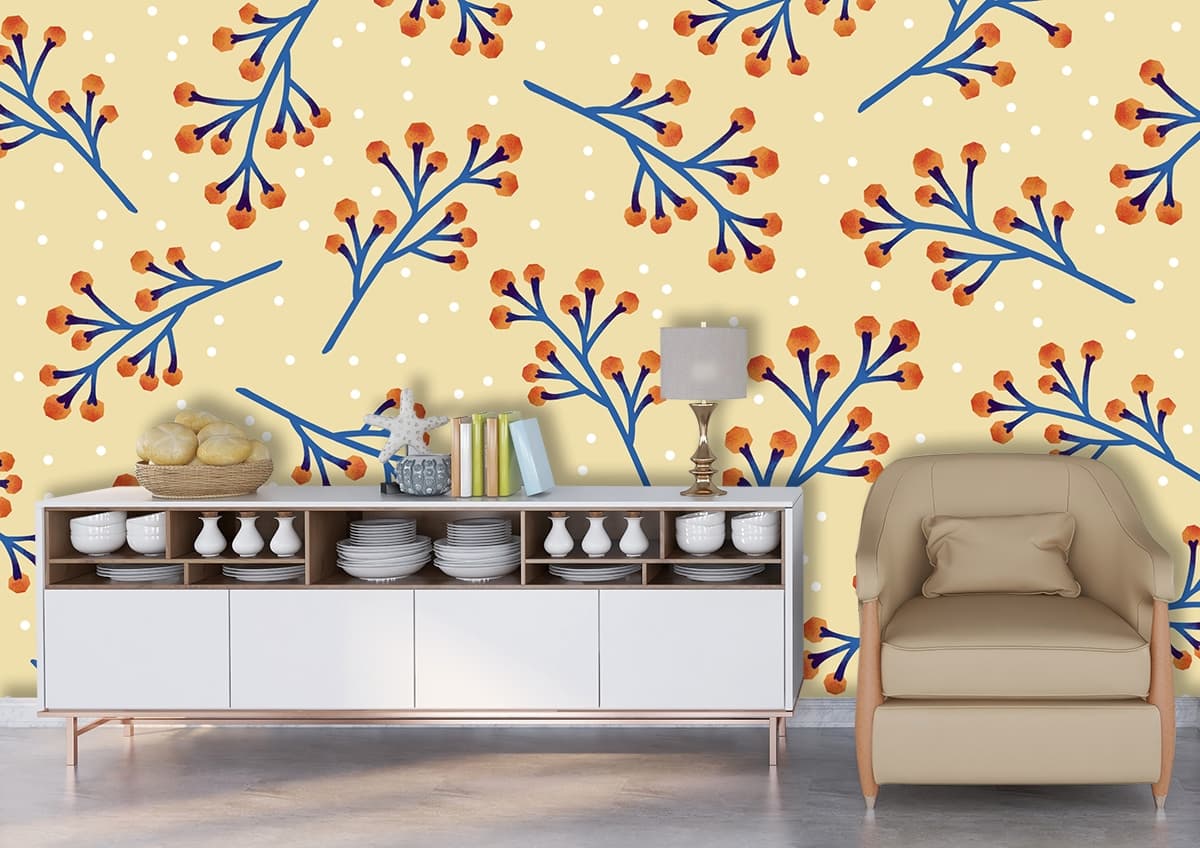 A pattern of orange berries on a yellow background shown in a room
