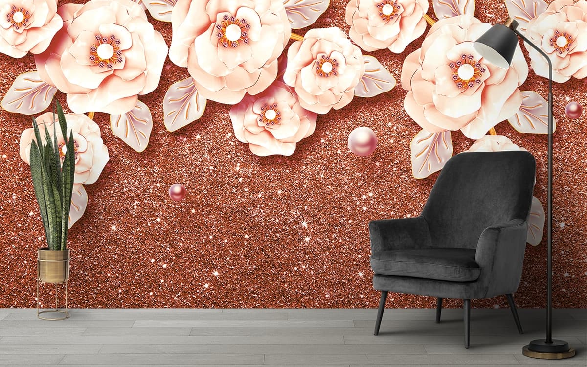 A group of flowers on a glittery surface shown in a room
