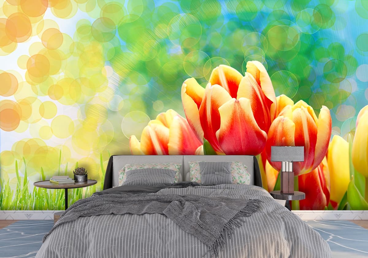 A group of tulips in a field of grass shown in a room