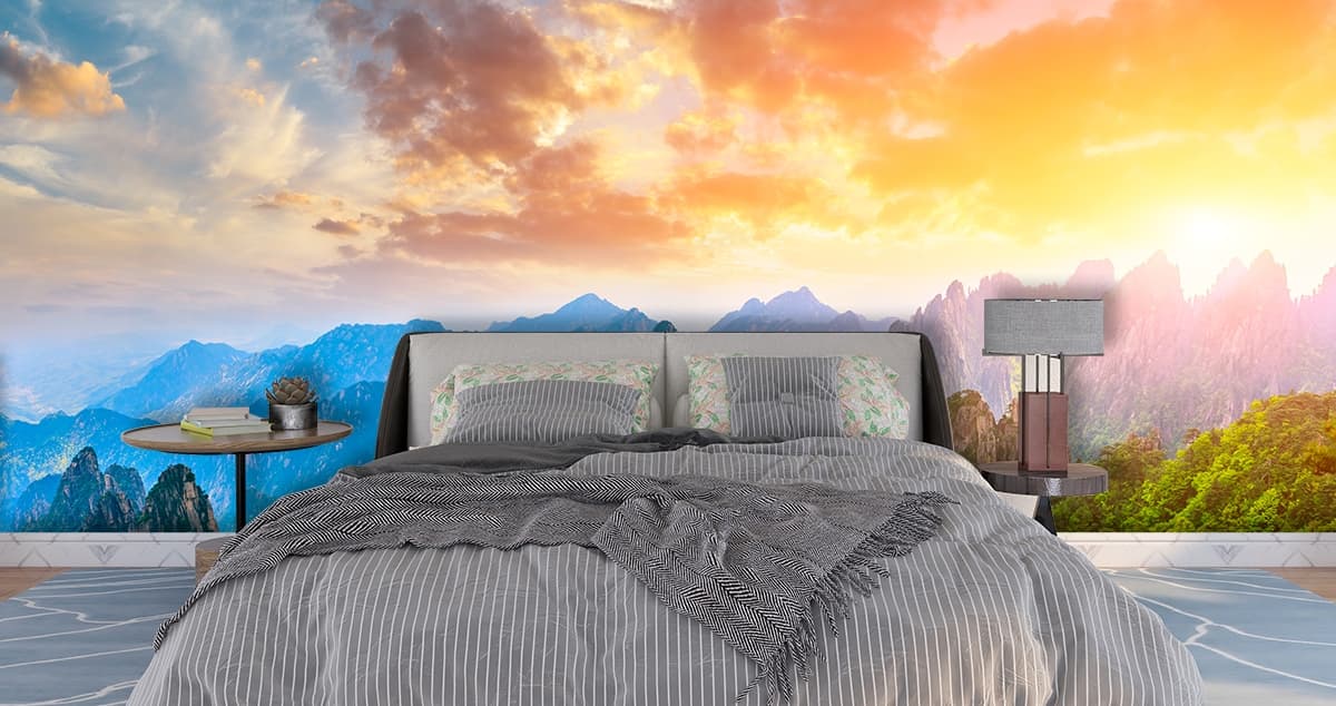 Radiant Sunset Peaks Panorama Wallpaper shown in a room