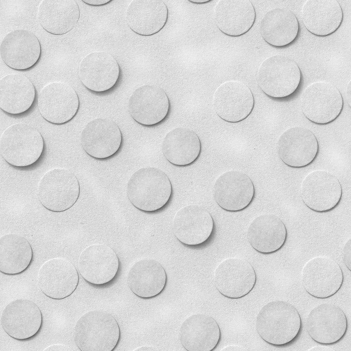 A white circle pattern on a white surface pattern detail