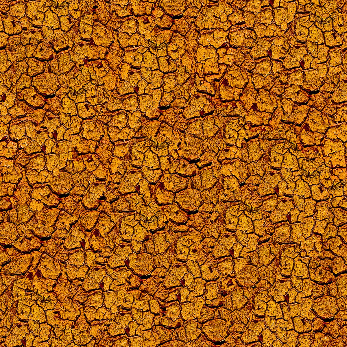 A close up of a cracked surface pattern detail