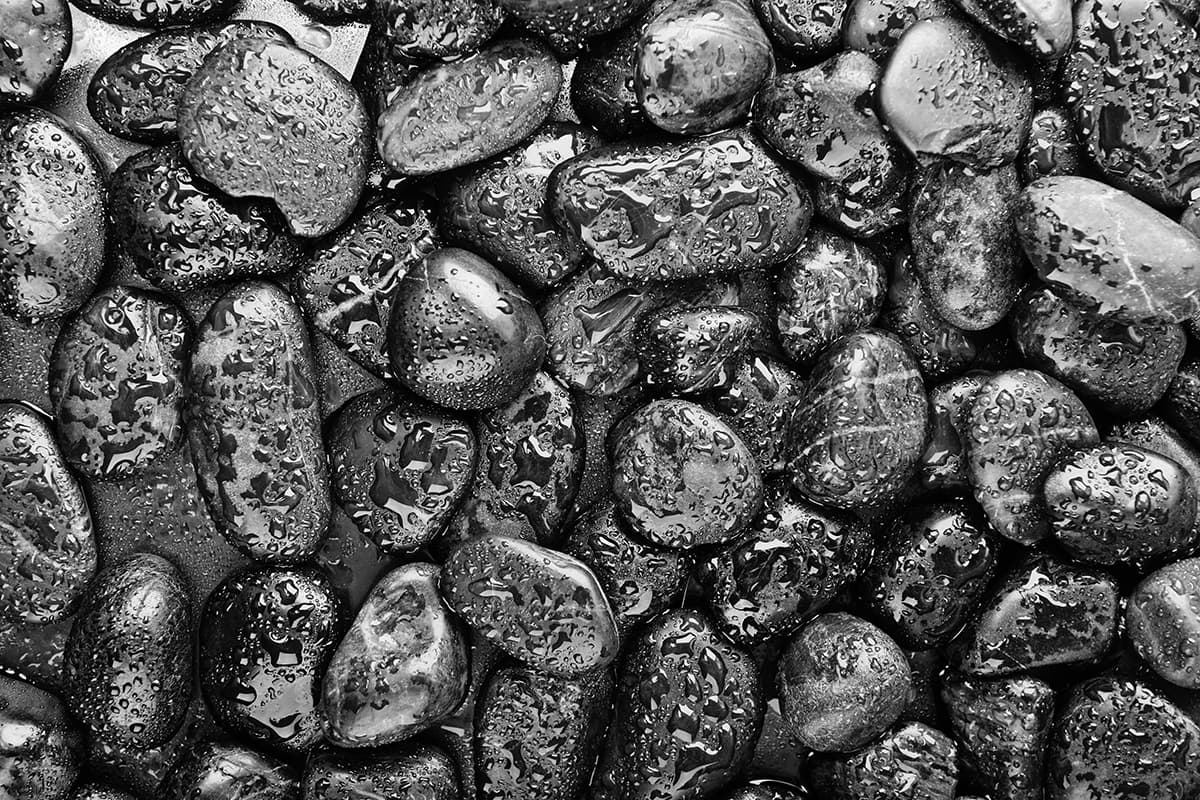 A group of wet rocks pattern detail