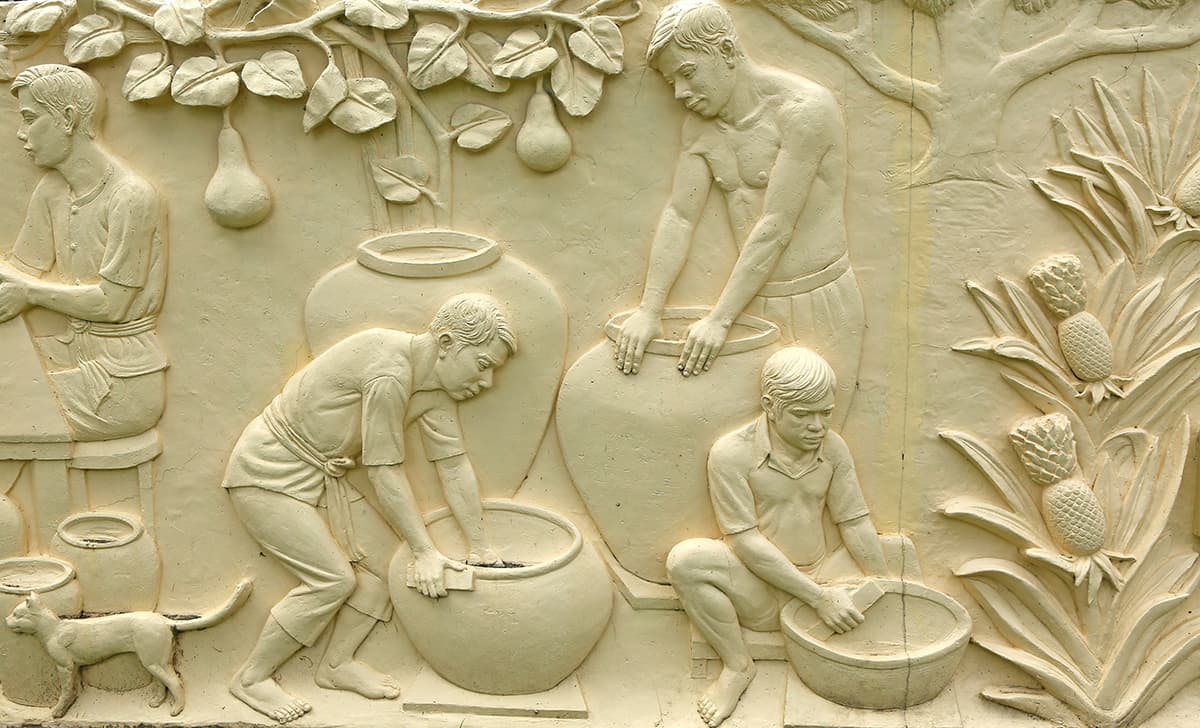Elegant Stone Carving of Pottery Workers Wallpaper pattern detail
