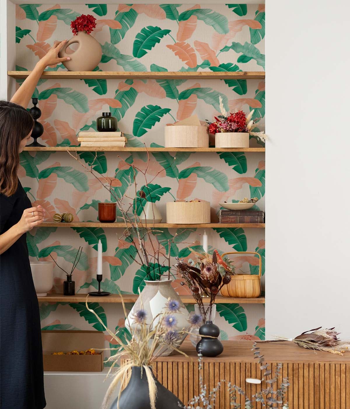 Exotict Jungle: Maximalistic Tropical Leaf Wallpaper shown in a room
