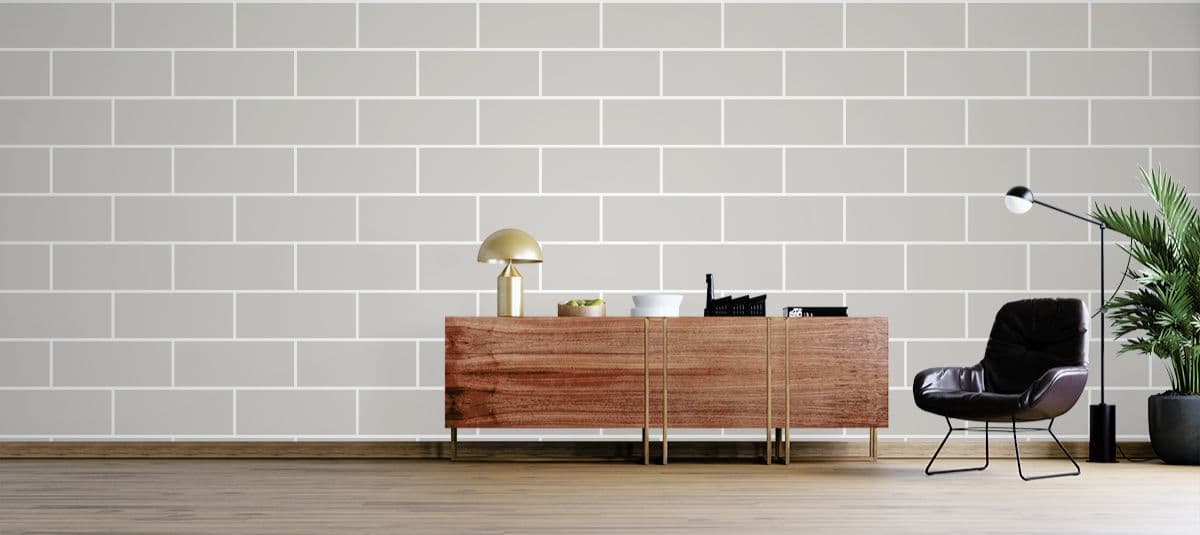 Creamy White Brickwork Mural Wallpaper shown in a room