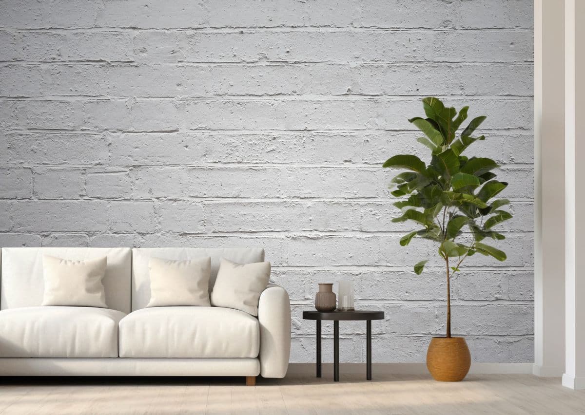 Ivory Vintage Brick Wall Mural Wallpaper shown in a room