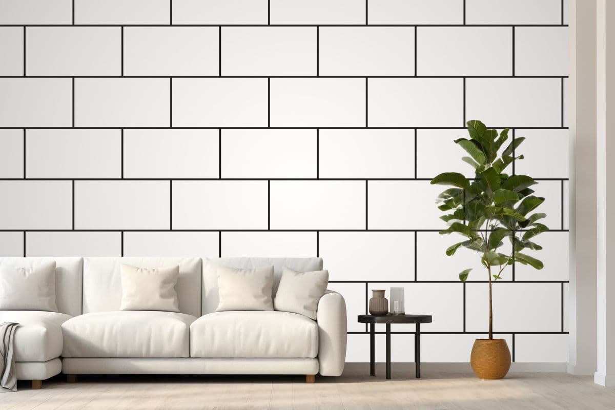 White Bricktoon Delight Mural Wallpaper shown in a room
