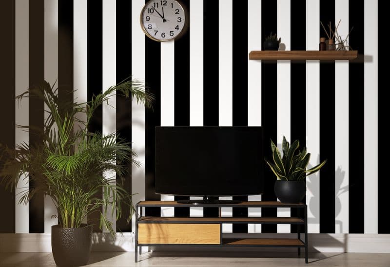 Black and White Vertical Stripes Wallpaper shown in a room