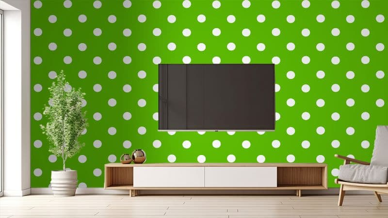 Green Polka Dots Harmony Mural Wallpaper shown in a room