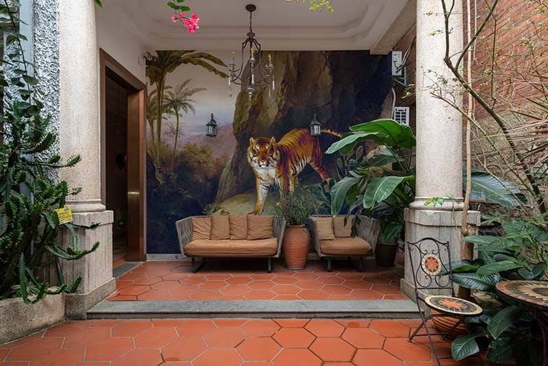Royal Tiger in a Forest Painting Wallpaper shown in a room