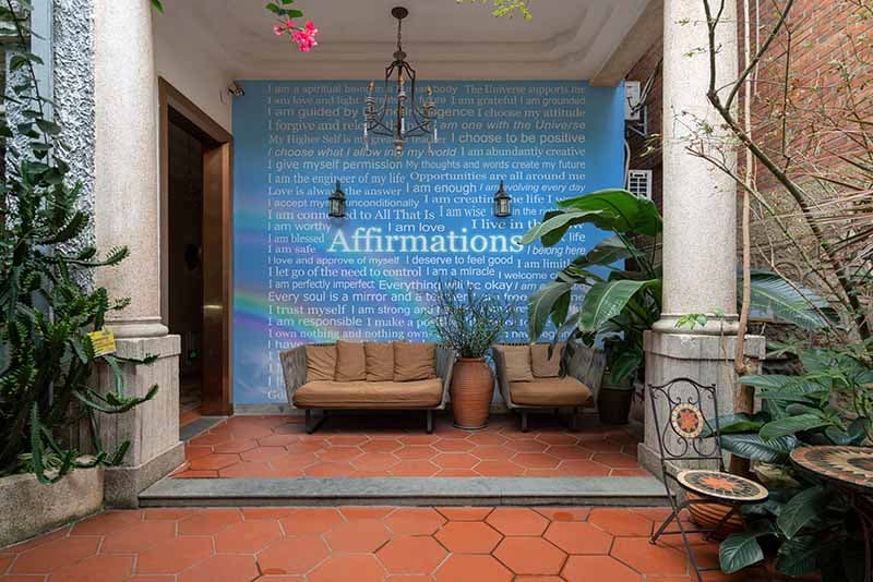Must Read Daily Affirmation Wallpaper Mural shown in a room