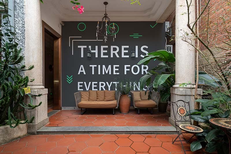 There is A Time for Everything Wallpaper Mural shown in a room