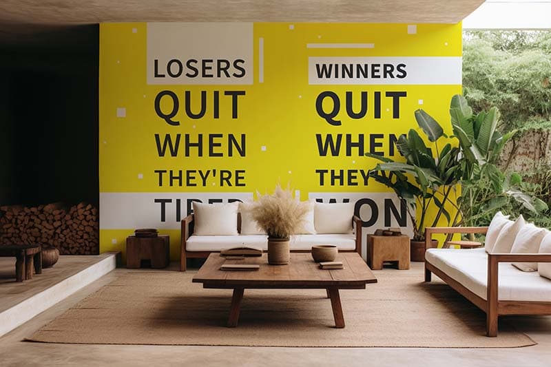 Winners And Losers Quote Wallpaper Mural shown in a room