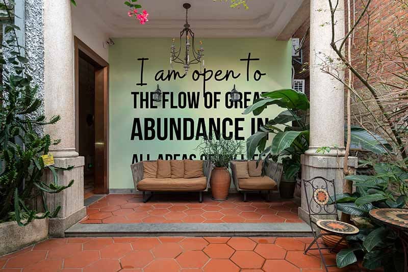 I Am Open to Abundance Wallpaper Mural shown in a room