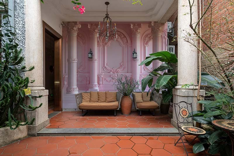 3D Pink Rococo Relief Wall Mural Wallpaper shown in a room