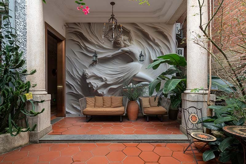 Dancing Ballerina Sculpture Mural Wallpaper shown in a room