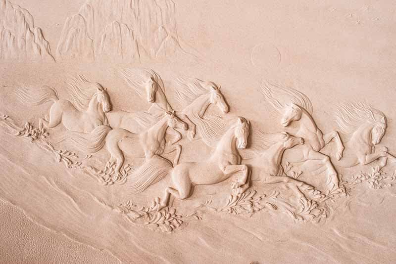 Running Horses Sculpted on Walls Wallpaper Mural pattern detail