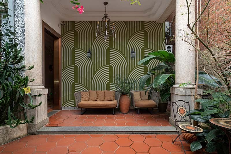 Geometric Ivory Green Shades Wallpaper Mural shown in a room