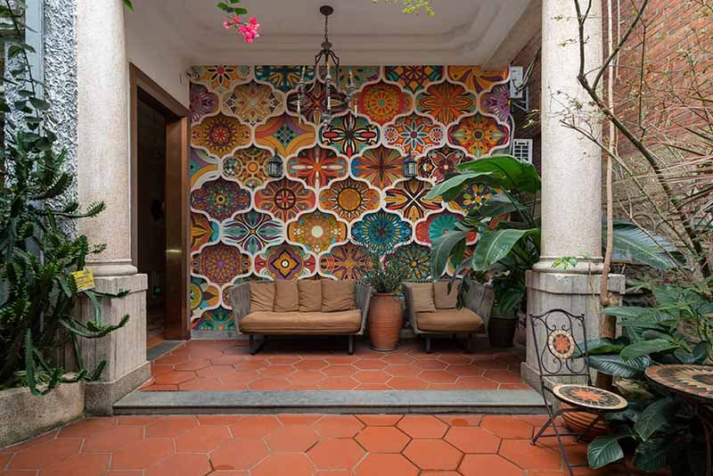 Ethnic Floral Mandala Mosaic Wallpaper Mural shown in a room