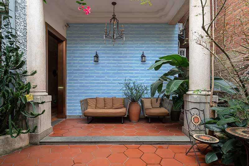 Colorful Bright Blue Brick Wallpaper Mural shown in a room