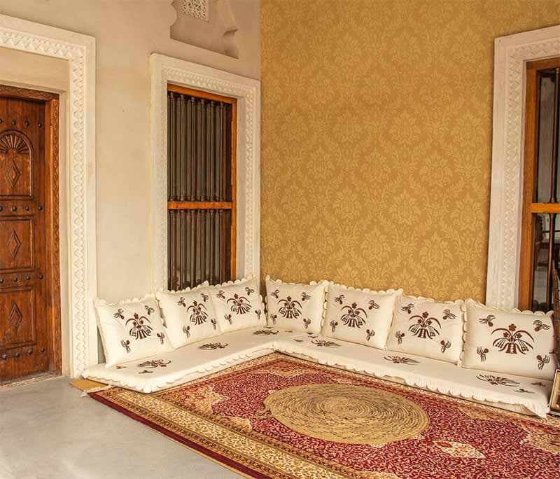 Golden Dynasty Elegance Damask Wallpaper Mural shown in a room