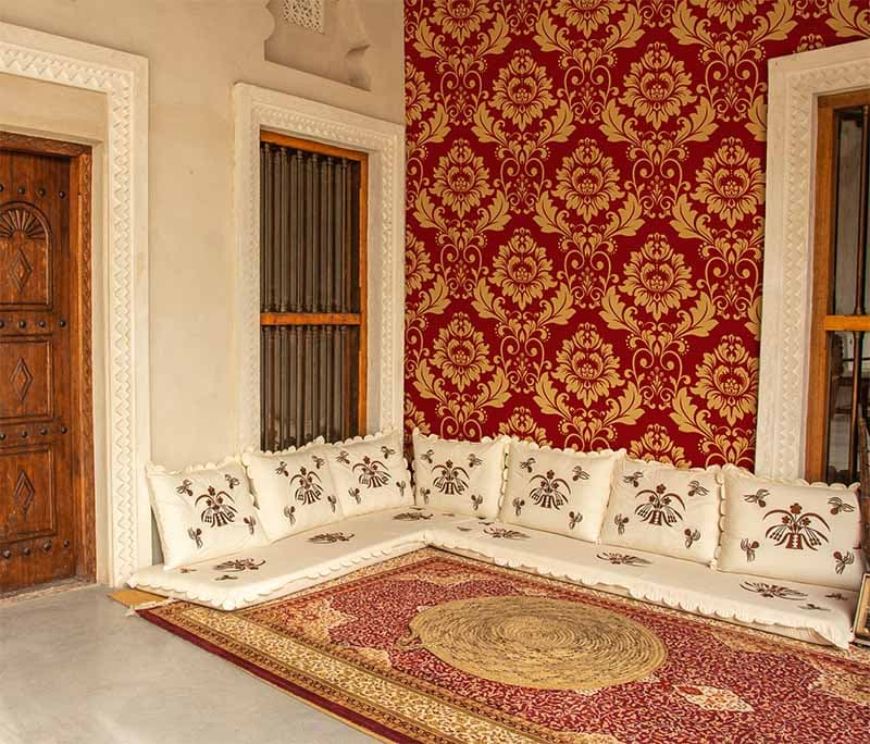 Regal Gold Embellishments Wallpaper Mural shown in a room