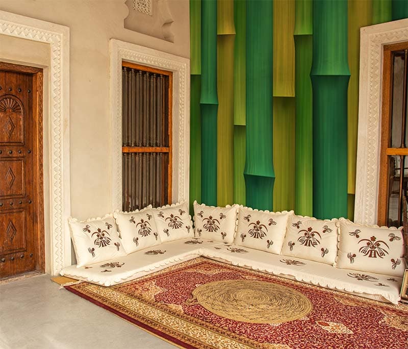 Elegant Green Bamboo Harmony Scene wallpaper shown in a room